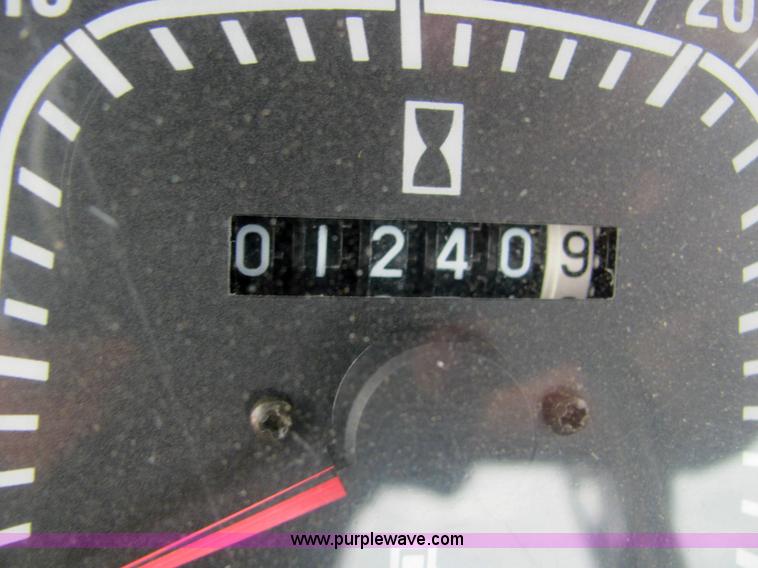 image for item 6942 2002 New Holland TS100 tractor with side-boom mower