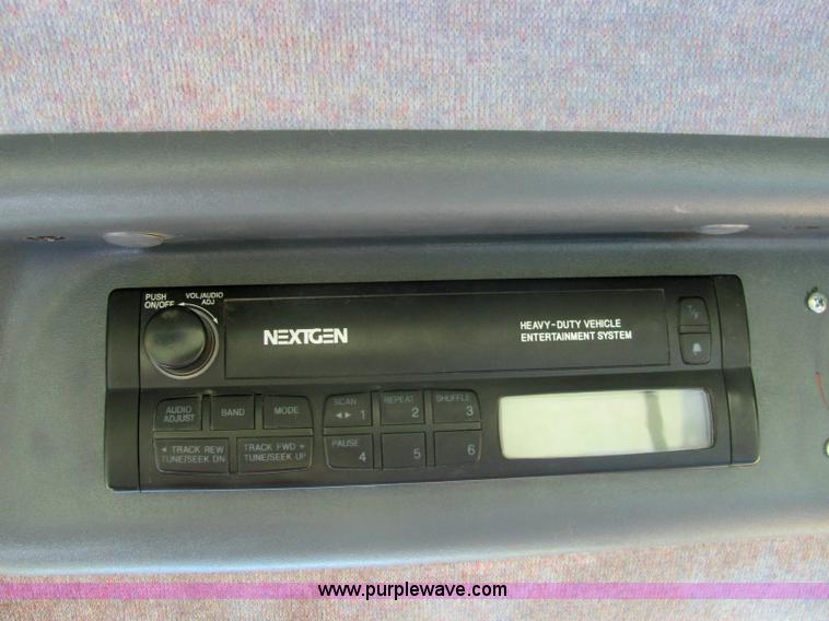 image for item 6942 2002 New Holland TS100 tractor with side-boom mower