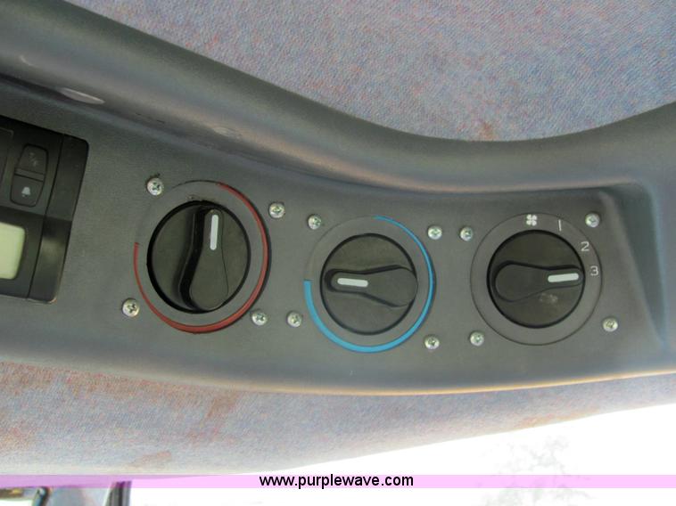 image for item 6942 2002 New Holland TS100 tractor with side-boom mower