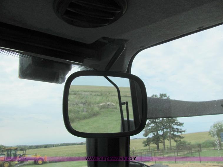 image for item 6942 2002 New Holland TS100 tractor with side-boom mower