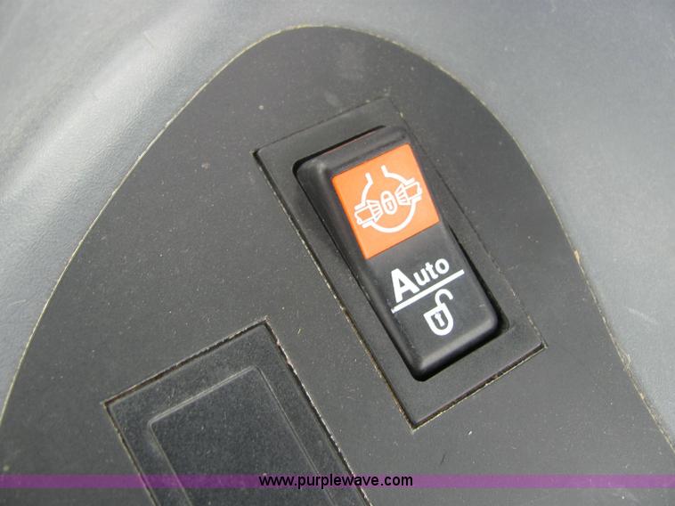 image for item 6942 2002 New Holland TS100 tractor with side-boom mower