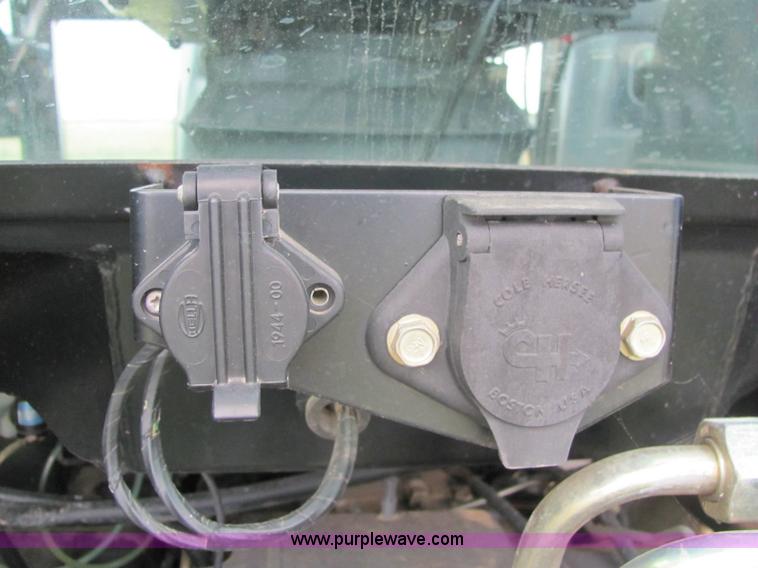 image for item 6942 2002 New Holland TS100 tractor with side-boom mower