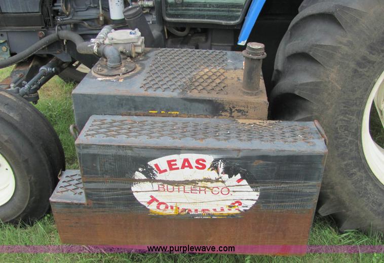 image for item 6942 2002 New Holland TS100 tractor with side-boom mower