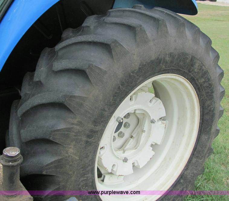 image for item 6942 2002 New Holland TS100 tractor with side-boom mower