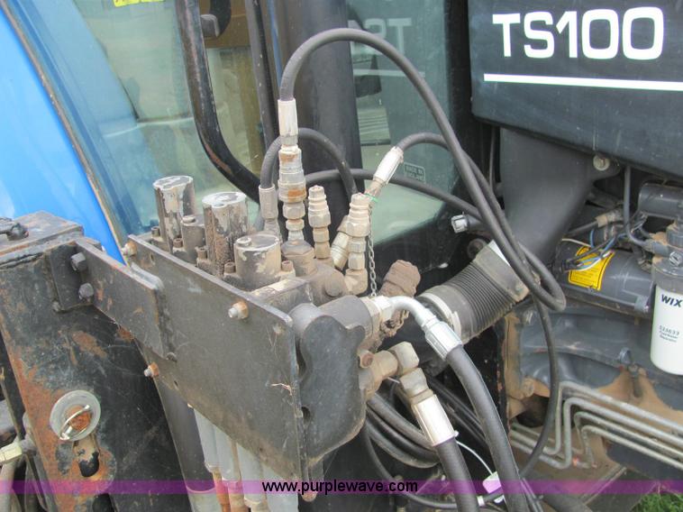 image for item 6942 2002 New Holland TS100 tractor with side-boom mower