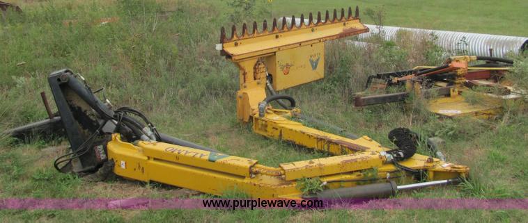 image for item 6942 2002 New Holland TS100 tractor with side-boom mower