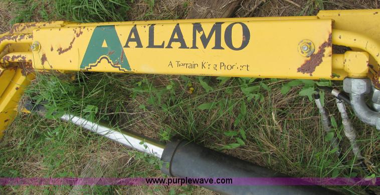 image for item 6942 2002 New Holland TS100 tractor with side-boom mower