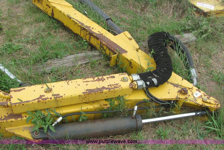 image for item 6942 2002 New Holland TS100 tractor with side-boom mower