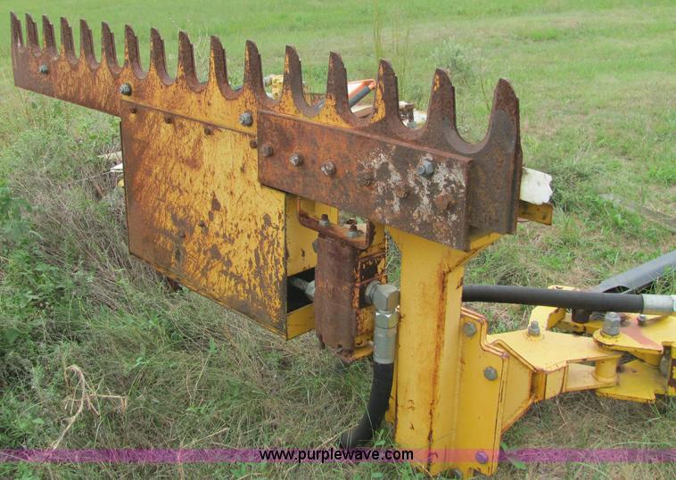 image for item 6942 2002 New Holland TS100 tractor with side-boom mower