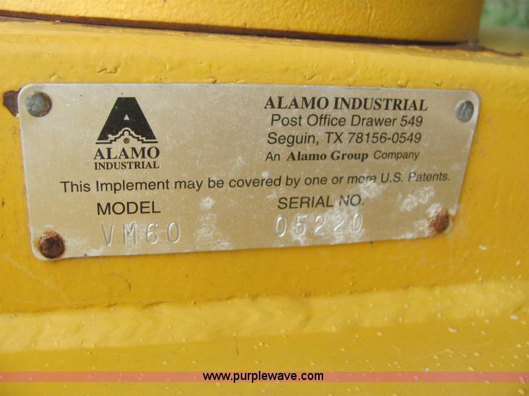 image for item 6942 2002 New Holland TS100 tractor with side-boom mower