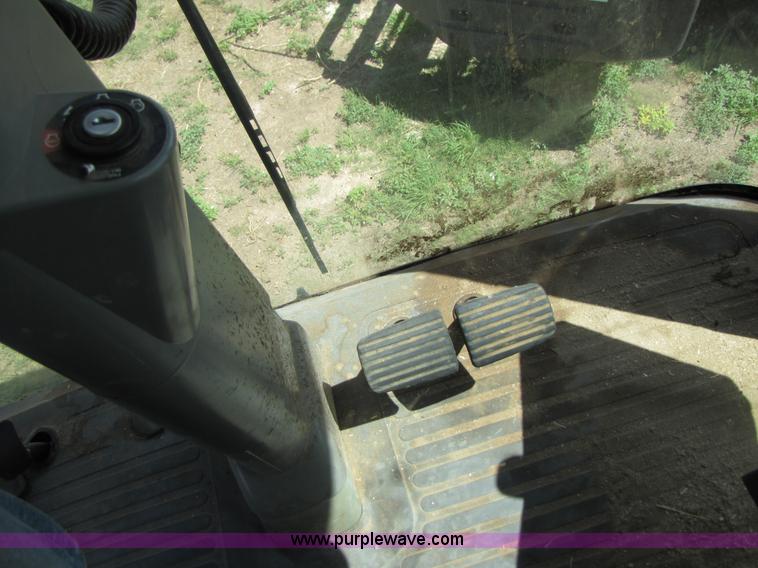 image for item 3140 1999 Caterpillar Lexion 480 RWA combine