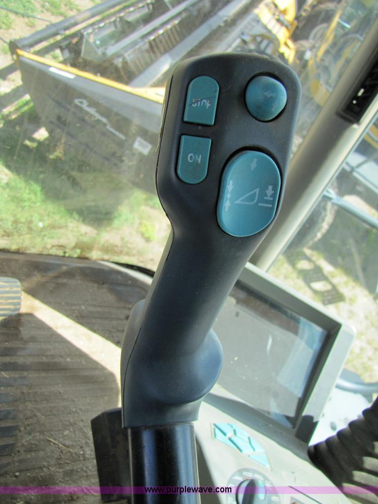 image for item 3140 1999 Caterpillar Lexion 480 RWA combine