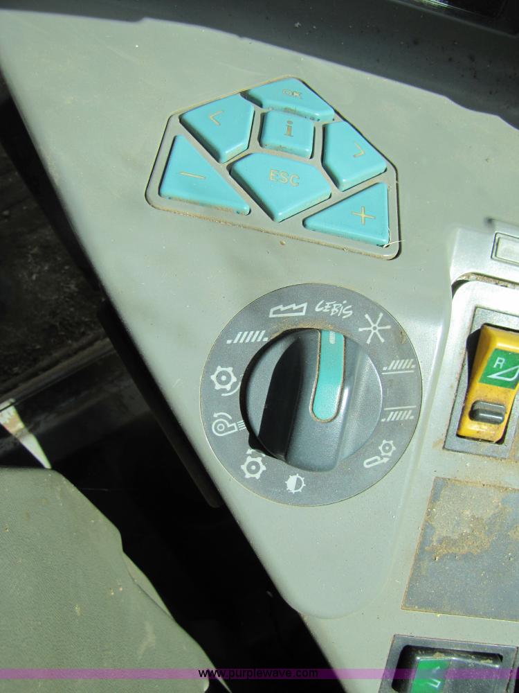 image for item 3140 1999 Caterpillar Lexion 480 RWA combine