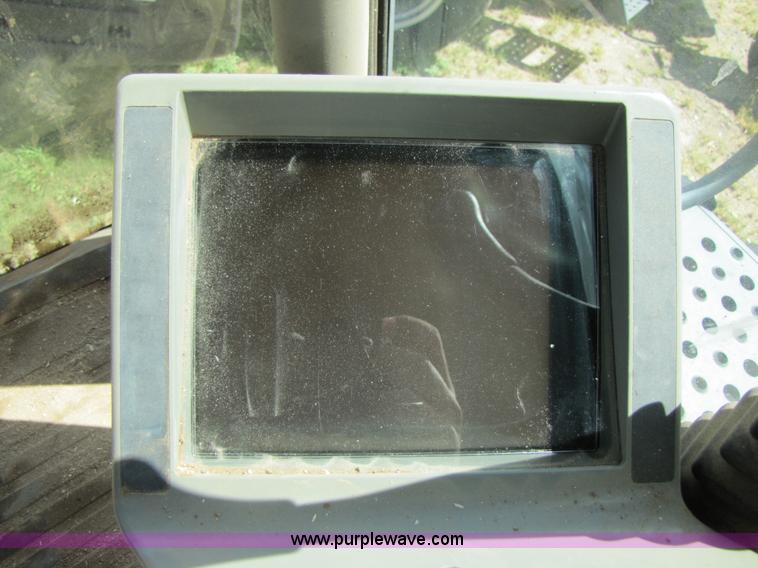 image for item 3140 1999 Caterpillar Lexion 480 RWA combine