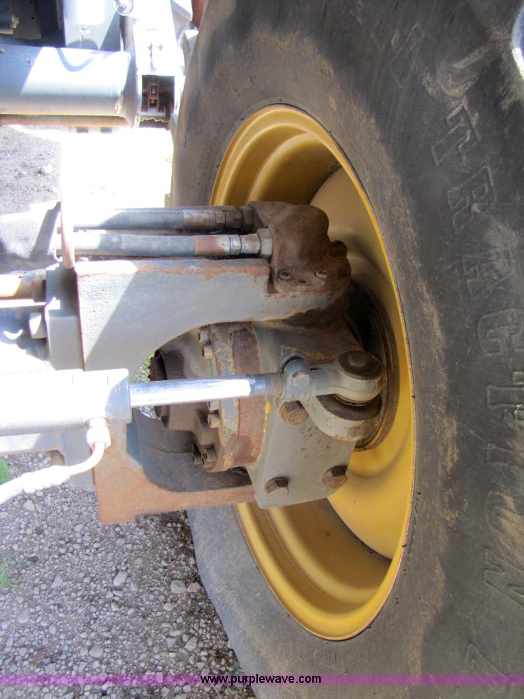 image for item 3140 1999 Caterpillar Lexion 480 RWA combine