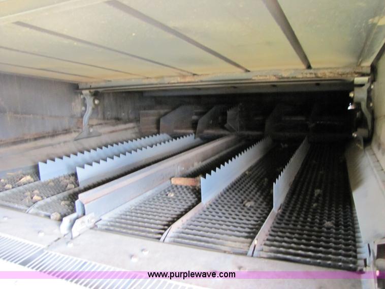 image for item 3140 1999 Caterpillar Lexion 480 RWA combine