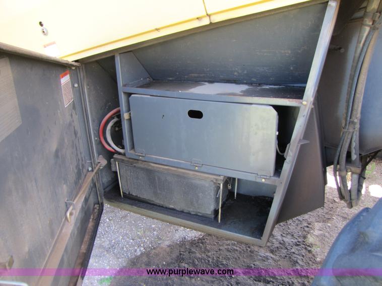 image for item 3140 1999 Caterpillar Lexion 480 RWA combine