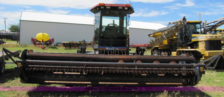 image for item 3142 1998 Mac Don self-propelled windrower with Mac Don 16'auger head