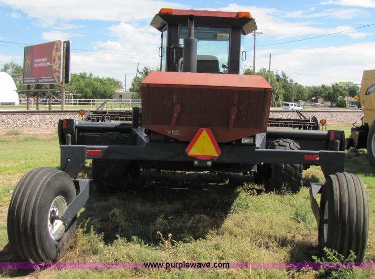 image for item 3142 1998 Mac Don self-propelled windrower with Mac Don 16'auger head