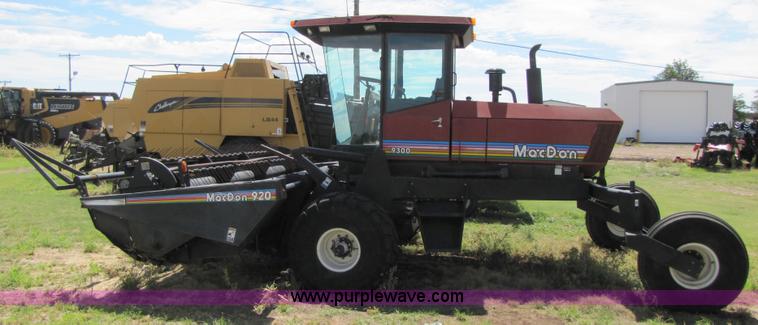 image for item 3142 1998 Mac Don self-propelled windrower with Mac Don 16'auger head