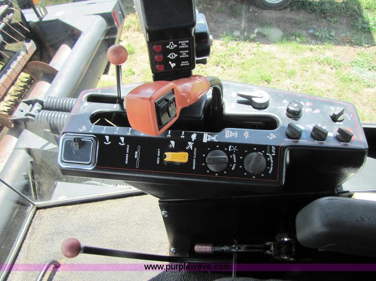 image for item 3142 1998 Mac Don self-propelled windrower with Mac Don 16'auger head