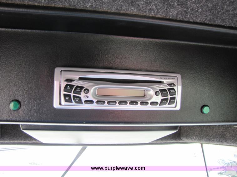 image for item 3142 1998 Mac Don self-propelled windrower with Mac Don 16'auger head