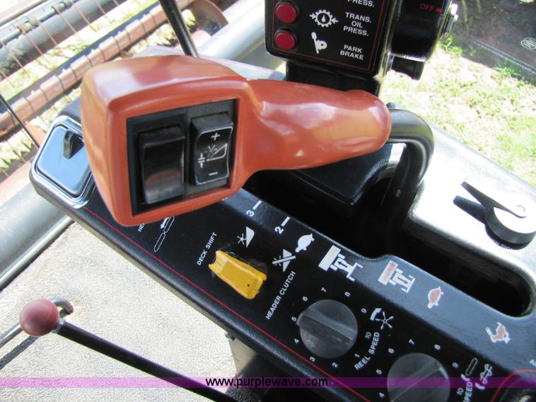 image for item 3142 1998 Mac Don self-propelled windrower with Mac Don 16'auger head