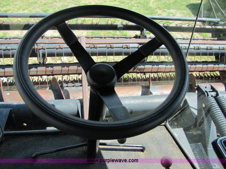 image for item 3142 1998 Mac Don self-propelled windrower with Mac Don 16'auger head