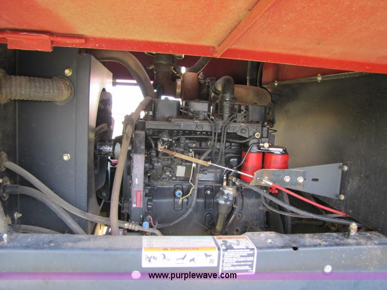 image for item 3142 1998 Mac Don self-propelled windrower with Mac Don 16'auger head