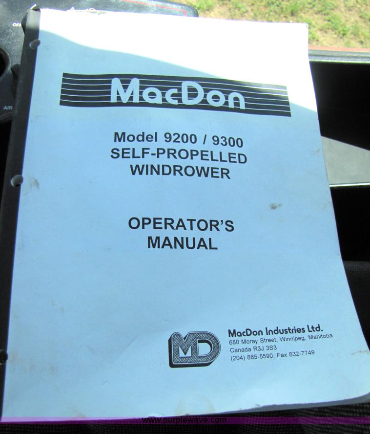 image for item 3142 1998 Mac Don self-propelled windrower with Mac Don 16'auger head