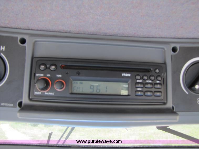 image for item 3143 2006 New Holland TJ375 4WD tractor with Grouser six-way blade