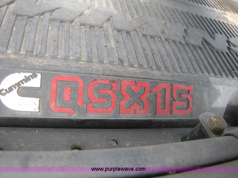 image for item 3143 2006 New Holland TJ375 4WD tractor with Grouser six-way blade