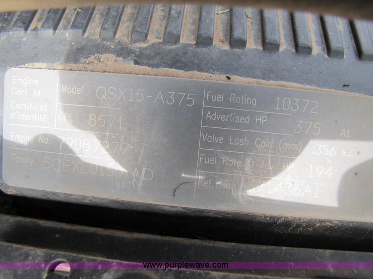 image for item 3143 2006 New Holland TJ375 4WD tractor with Grouser six-way blade