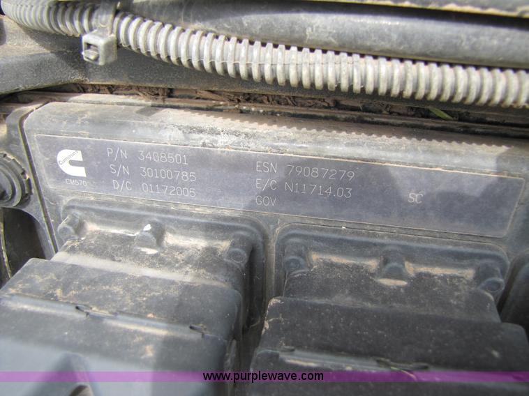 image for item 3143 2006 New Holland TJ375 4WD tractor with Grouser six-way blade