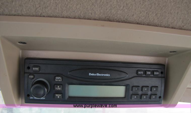 image for item 3144 2004 John Deere 9620 4WD tractor with Grouser 18' two-way blade