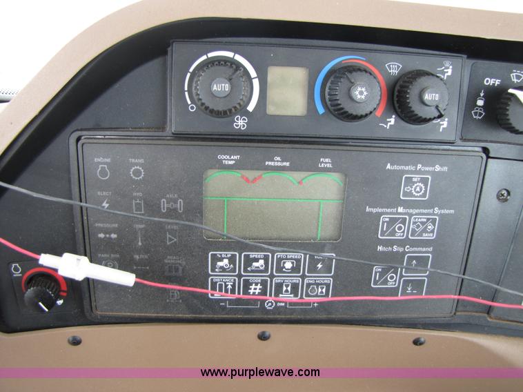 image for item 3144 2004 John Deere 9620 4WD tractor with Grouser 18' two-way blade