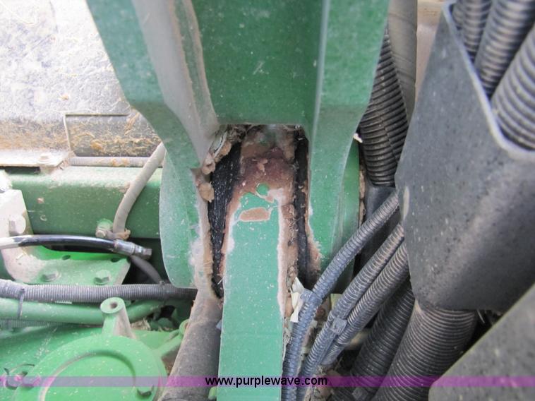 image for item 3144 2004 John Deere 9620 4WD tractor with Grouser 18' two-way blade