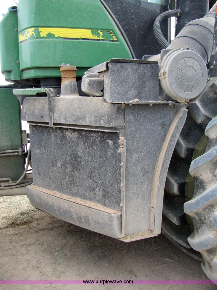 image for item 3144 2004 John Deere 9620 4WD tractor with Grouser 18' two-way blade