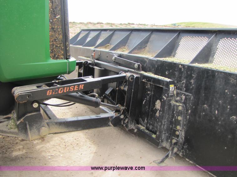 image for item 3144 2004 John Deere 9620 4WD tractor with Grouser 18' two-way blade