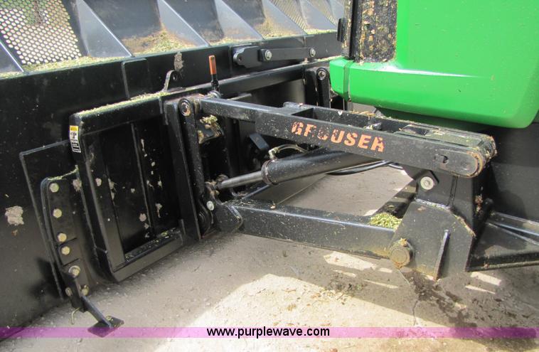 image for item 3144 2004 John Deere 9620 4WD tractor with Grouser 18' two-way blade
