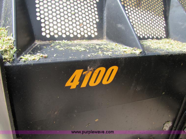 image for item 3144 2004 John Deere 9620 4WD tractor with Grouser 18' two-way blade