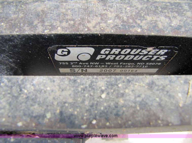 image for item 3144 2004 John Deere 9620 4WD tractor with Grouser 18' two-way blade