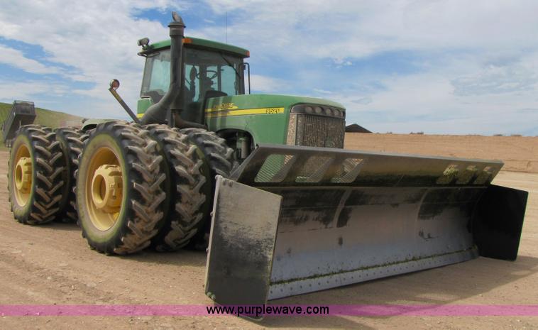image for item 3145 2005 John Deere 9520 4WD tractor with Grouser two-way blade
