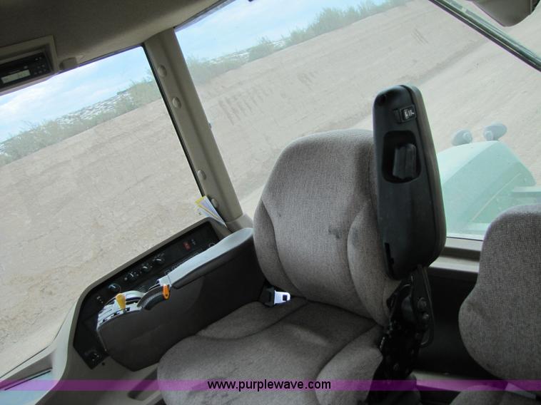 image for item 3145 2005 John Deere 9520 4WD tractor with Grouser two-way blade