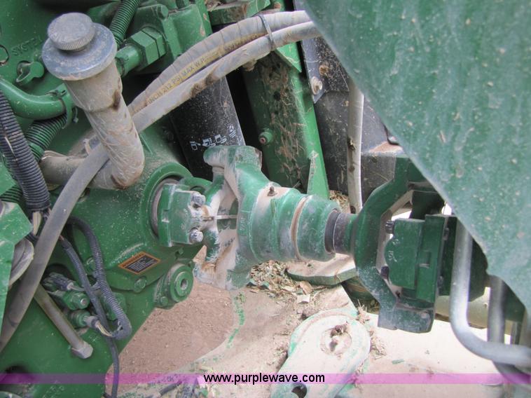 image for item 3145 2005 John Deere 9520 4WD tractor with Grouser two-way blade
