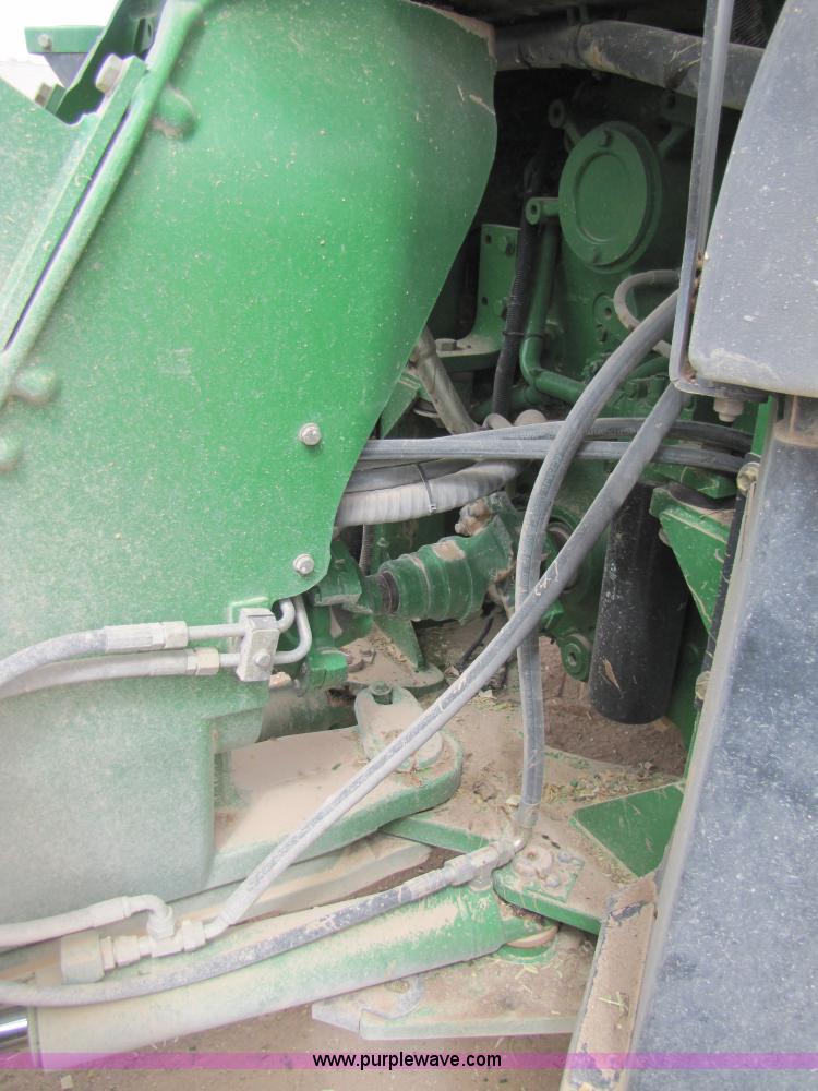 image for item 3145 2005 John Deere 9520 4WD tractor with Grouser two-way blade