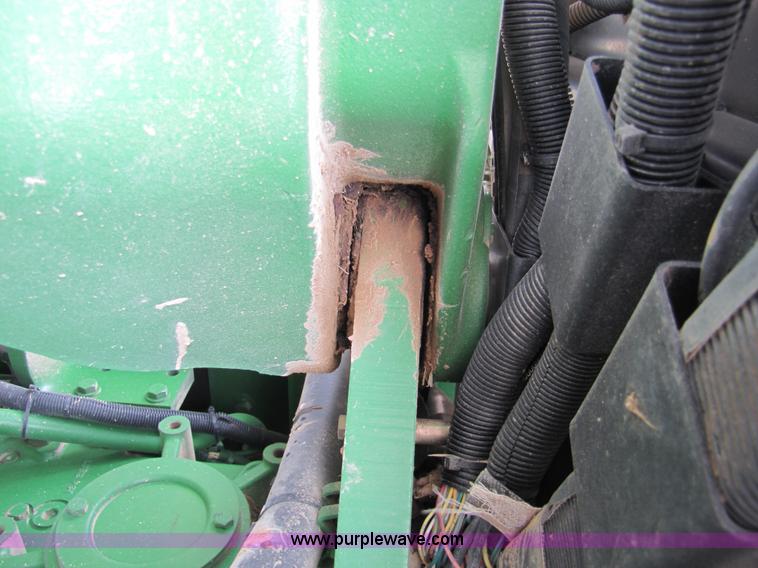 image for item 3145 2005 John Deere 9520 4WD tractor with Grouser two-way blade