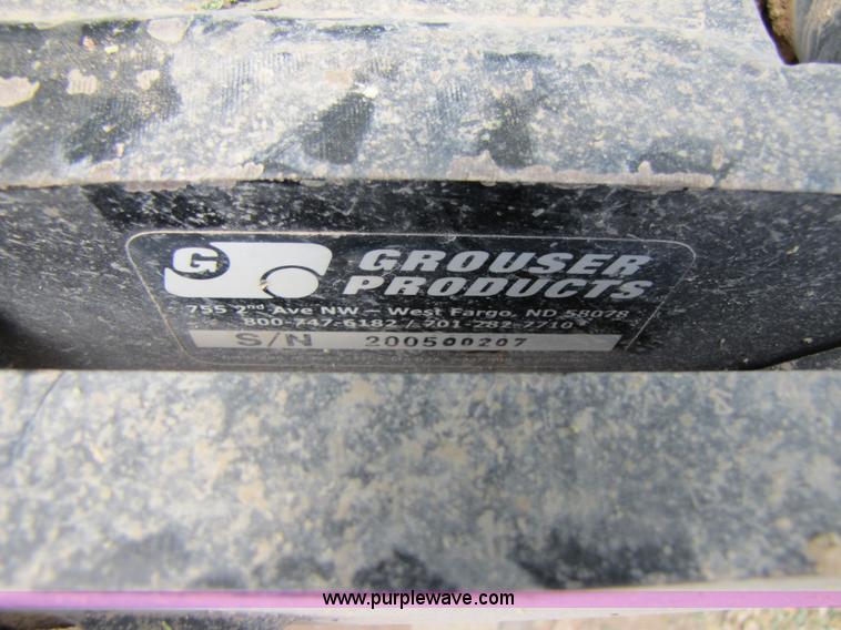 image for item 3145 2005 John Deere 9520 4WD tractor with Grouser two-way blade