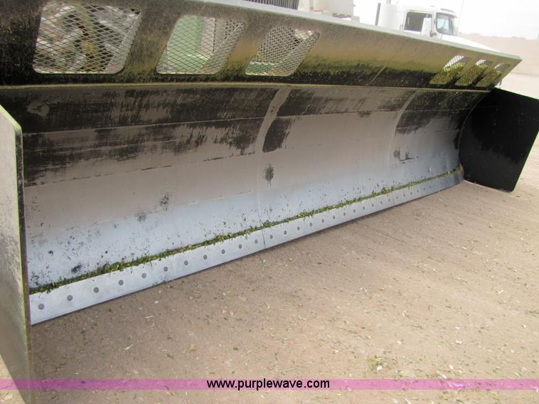 image for item 3145 2005 John Deere 9520 4WD tractor with Grouser two-way blade