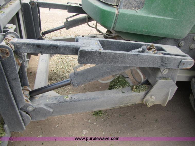 image for item 3145 2005 John Deere 9520 4WD tractor with Grouser two-way blade